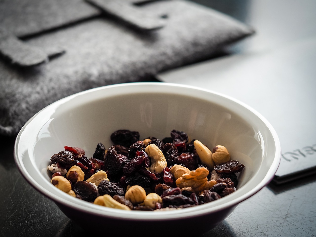 healthy snack of raisins and nuts in a bowl