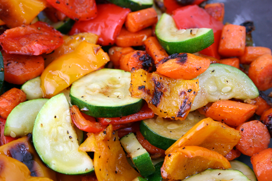 Healthy meal made of roasted vegetables - cucumbers, peppers, carrots