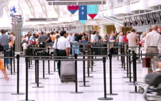 Passengers lining up at check-in counter at the modern international airport