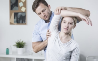 woman receiving San Antonio physical therapy for shoulder pain relief