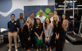 team smiling for best places to work 2020 award